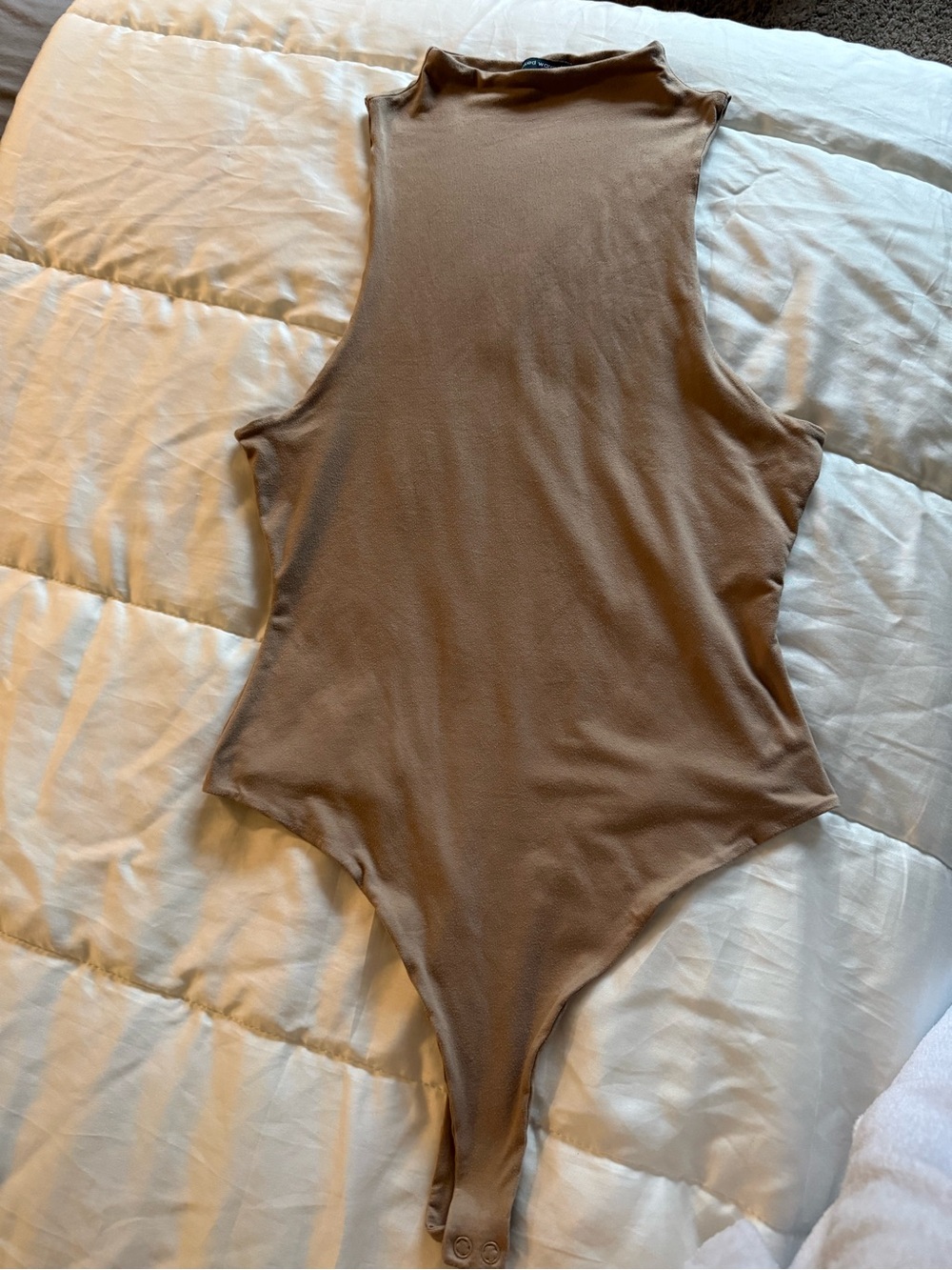 Naked Wardrobe Sleeveless Mock Neck One-Piece Bodysuit